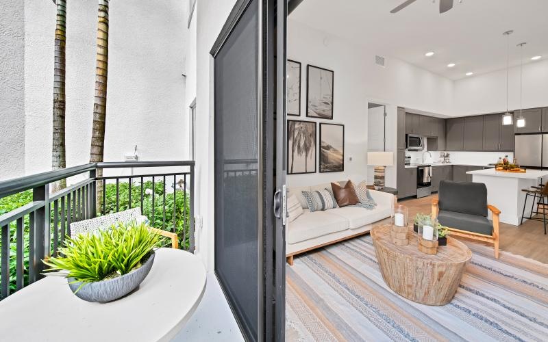 a living room with a balcony