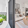 a living room with a balcony