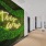 neon sign on wall with greenery