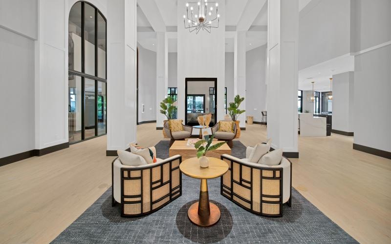 large clubroom with a couch and chairs